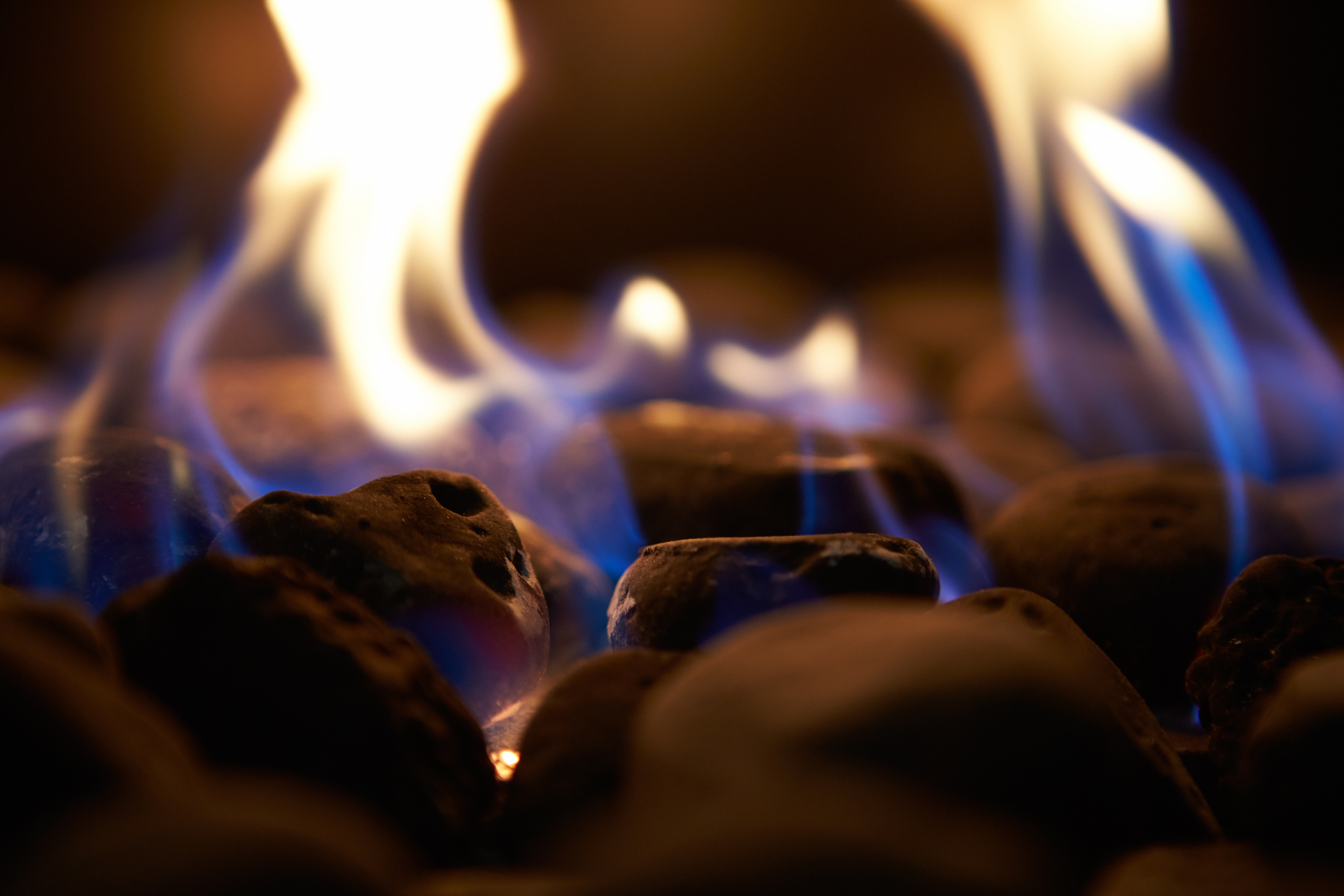 Close Up Of Flaming Coals On Gas Fire Close Up Of Flaming Coals On Gas Fire